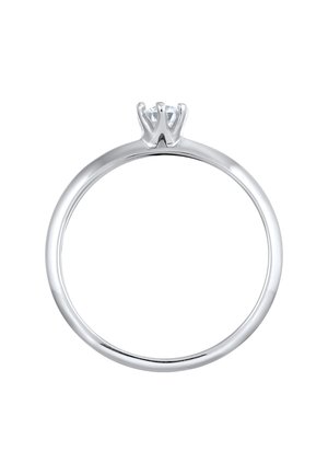 Bague en argent présentant un anneau lisse et minimaliste avec un sertissage à griffes tenant une seule pierre précieuse claire sur le dessus.