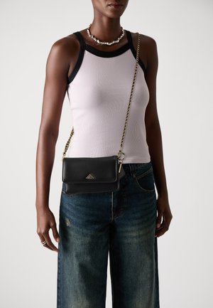 FIT EVERYTHING - Cross body bag - black