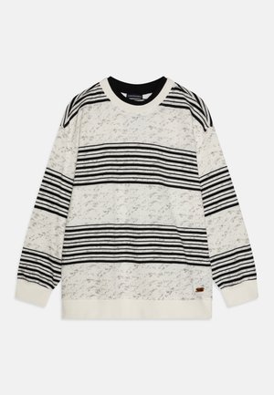 Maglione cream con strisce orizzontali nere, collo rotondo, motivo testurizzato e polsini e orlo a coste. Piccola etichetta decorativa nella parte inferiore.