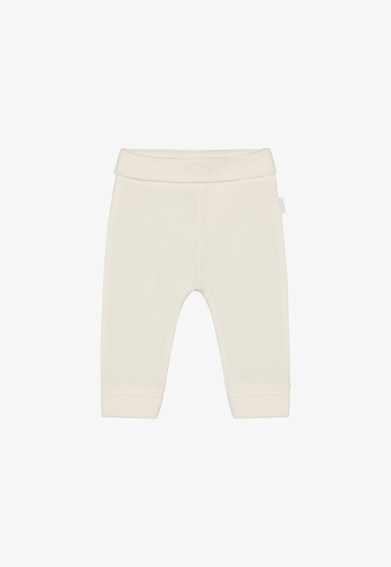 Leggings beige clair en mélange de coton avec une ceinture douce et extensible et des jambes effilées. Dotées de poignets côtelés à la cheville.
