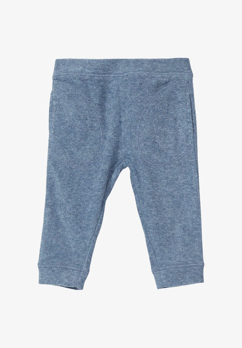 Leggings en coton doux bleu avec une texture chinée, taille élastique et deux poches latérales. Dotés de chevilles côtelées pour un ajustement parfait.