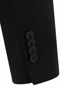 Zwarte op maat gemaakte colbertzoom met vier zwarte knopen en decoratieve stiksel details. Gladde stof met een gestructureerde vorm.