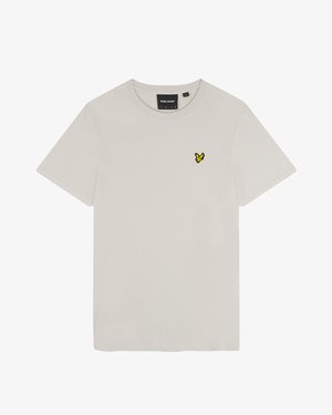 Világos bézs pamutpóló kerek nyakkivágással és rövid ujjú. Bal oldalon a mellrészen egy kis sárga madár logó található. Simulékony textúrájú.