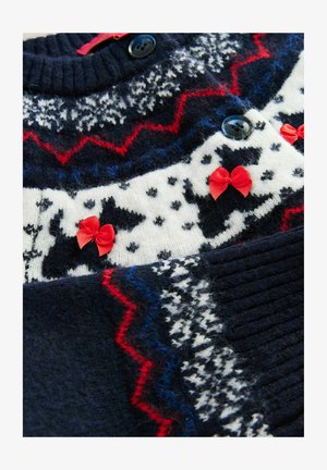 Navy knit sweater featuring white and red pattern with bows. Includes geometric designs and dog motifs. Soft texture with ribbed collar.