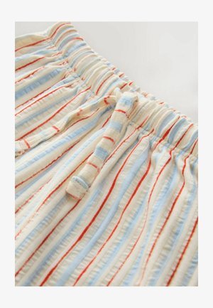 Gestreepte korte broek in crème, met blauwe en rode verticale strepen. Elastische tailleband met een trekkoord voor een verstelbare pasvorm. Zachte, gestructureerde stof.