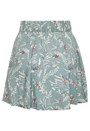 Lichtblauwe rok met elastische tailleband, versierd met witte botanische patronen en kleine, kleurrijke vogels in vlucht.