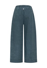 Donkere, wijde linnen broek met hoge taille, elastische tailleband en een klein label aan de voorzijde in het midden.