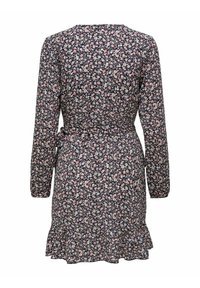 Robe à manches longues florale avec de petites fleurs roses et blanches sur fond foncé, taille cintrée et ourlet à volants, vue de dos.