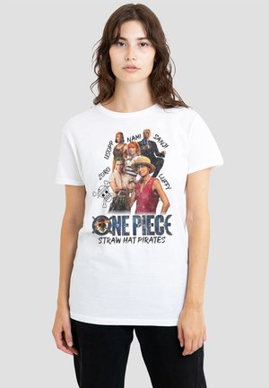 White cotton t-shirt featuring a graphic print of five anime characters and "One Piece Straw Hat Pirates" text below. Short-sleeved design.