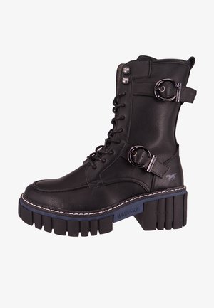 Black leather ankle boot with round toe, lace-up front, side buckles, and a chunky platform sole with a blue accent and white stitching.