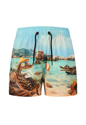 Shorts de bain avec une scène de plage représentant un crocodile détendu portant des lunettes de soleil et un chapeau, tenant un verre, près de l'eau et des rochers.