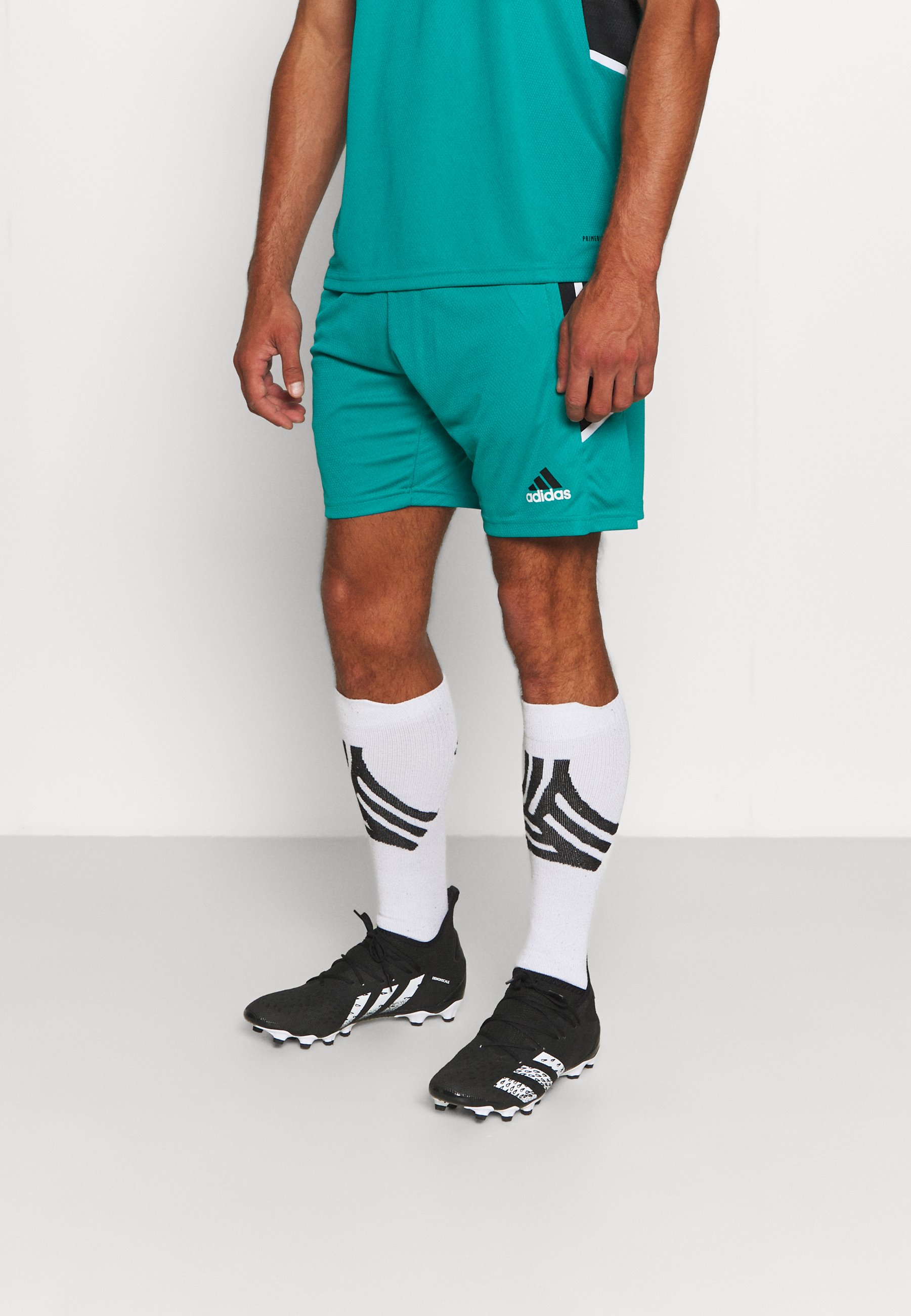 Puma MANCHESTER CITY FC ICONIC MCS - Pantalón corto de deporte - dark blue,  white/azul marino - Zalando.es