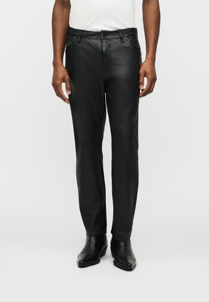EXCLUSIVE LYNCH TROUSER - Leather trousers - black