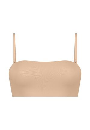 Bandeau-Bra aus weichem beigem Stoff, glatte Oberfläche, mit dünnen verstellbaren Trägern und nahtlosem Design für minimale Sichtbarkeit unter der Kleidung.