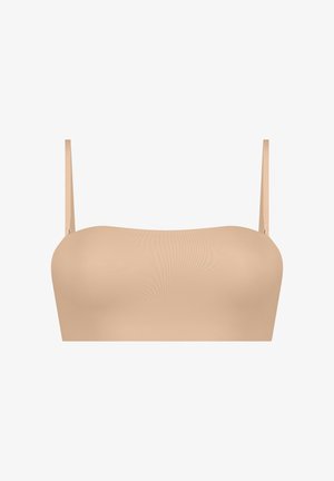 Bandeau-Bra aus weichem beigem Stoff, glatte Oberfläche, mit dünnen verstellbaren Trägern und nahtlosem Design für minimale Sichtbarkeit unter der Kleidung.