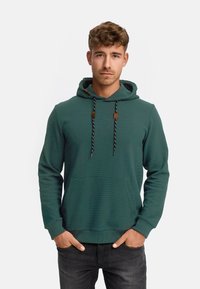 Grüner Hoodie aus strukturierter Stoff, mit einer Fronttasche, Kapuzenkordeln mit braunen Akzenten und gerippten Bündchen.