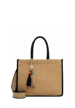 Woven straw tote bag with black trim. Features two black handles and decorative tassels with beads and shells. Adjustable shoulder strap included.