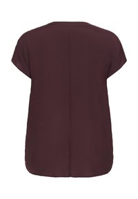 Maroon short-sleeve top with a rounded neckline and a loose, relaxed fit. Soft, textured fabric with a slightly longer back hem.