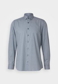 Button-up Hemd mit einem geometrischen Muster in Marineblau und Hellblau, langärmlig und mit klassischem Kragen, ausgestattet mit blauen Knöpfen.