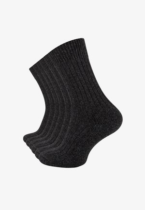 Un paio di calzini a coste grigi scuri esposti affiancati su uno sfondo bianco.