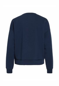 Sweat-shirt bleu marine, avec un col rond, des épaules tombantes et des poignets côtelés. Tissu doux avec un design simple et épuré au dos.