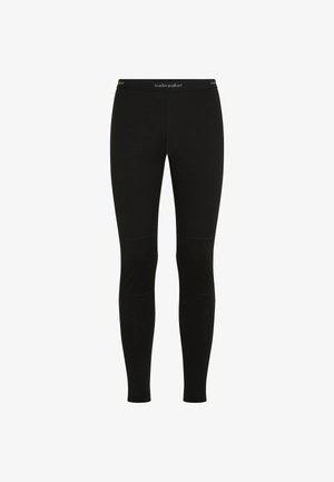 Leggings thermiques noirs ajustés avec une taille élastique arborant le logo "icebreaker" en blanc.
