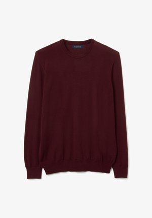 Maglione bordeaux a girocollo con maniche lunghe, polsini e orlo a coste, realizzato in morbido tessuto knit. Etichetta visibile sul collo.