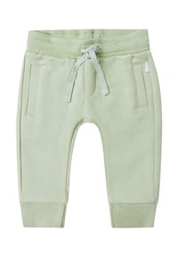 Lichtgroene sweatpants met geribde boorden en tailleband, trekkoordsluiting en twee zijzakken. Zachte stof met een soepele textuur.