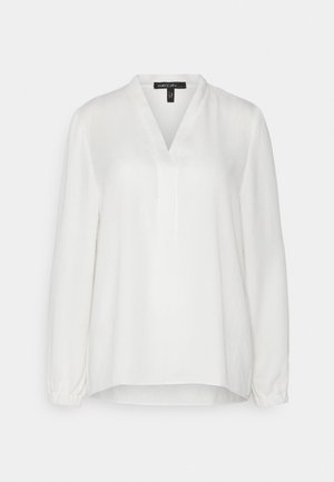Bílá dlouhá blůza s dlouhými rukávy vyrobená z lehkého materiálu, s výstřihem do V, elastickými manžetami a volným střihem. Hladký povrch s jemným leskem.