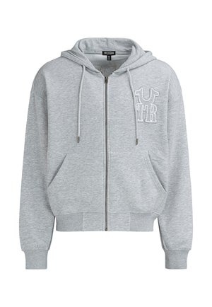 Szara bluza z kapturem zapinana na zamek, z regulowanym kapturem na sznurek, przednimi kieszeniami i wyszywanym logo UTR na lewej piersi. Wykonana z miękkiego, teksturowanego materiału.