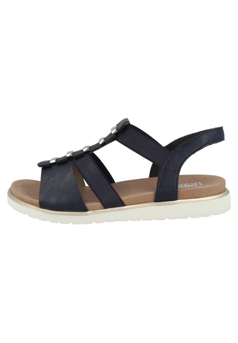 Navy blue sandal with elastic straps and decorative silver accents. Features a cushioned insole and lightweight white rubber sole.