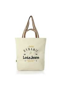 Bolsa de lona de algodón en color crema con asas marrones. Presenta texto impreso "Lois Jeans" y gráficos. Forma rectangular, diseño simple.