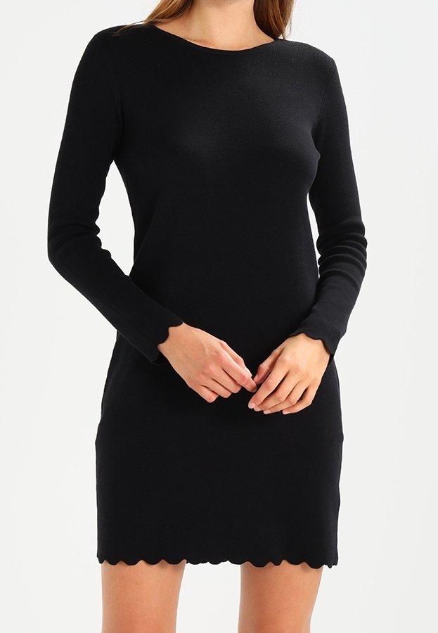 Black long-sleeve dress made of knit fabric, featuring a rounded neckline and a scalloped hem. Smooth texture, fitted silhouette.