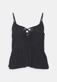 Top peplum preto com alças finas ajustáveis, apresentando um detalhe de laço na frente e um tecido texturizado com um inserto de renda.