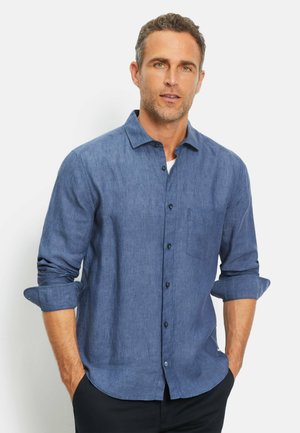 Blue linen shirt with a button-down collar, chest pocket, and rolled-up sleeves, featuring black buttons and a textured finish.