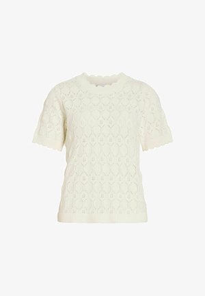 Kreemjas lühikeste varrukatega kudumpluus koolitatud äärega ja tekstiilil läbiva reljeefse avatud mustriga.