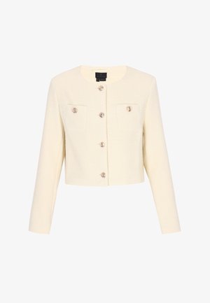 Jachetă scurtă texturată, de culoare crem, cu mâneci lungi, guler rotund, cinci nasturi în față și două buzunare cu nasturi pe piept.