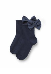Mørkeblå bomuldsstrømper med ribbet tekstur og en stor matchende sløjfeaccent på siden. Klassisk ankel-længde design.