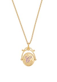 Gold-toned pendant necklace with a circular locket featuring a cursive purple "C," surrounded by small star details, on a delicate chain.