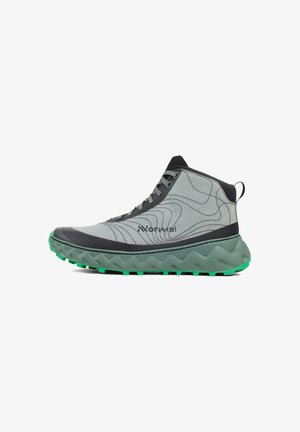 Gray high-top athletic shoe with textured upper, green accents on sole, and a wave pattern. Features a thick, cushioned rubber sole.