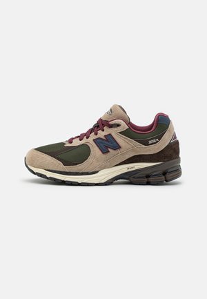 New Balance, Baskets basses - beige