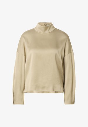 Beige bluse med lange ermer, løs passform og høy hals, med enkelt knappelukking bak.