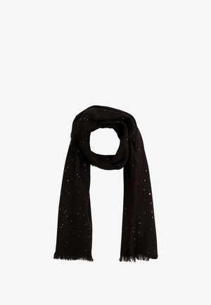 Bufanda negra con patrón de puntos plateados, hecha de tela suave, con bordes deshilachados. Colocada en estilo de bucle.