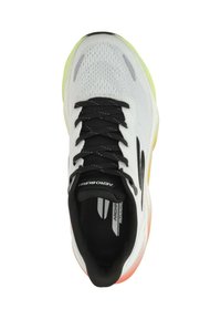 White mesh athletic shoe with black accents and lightweight sole. Features lace-up design, cushioned interior, and multicolor heel.