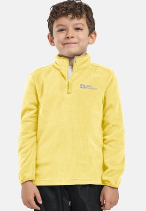 Pull en polaire jaune avec un col zippé à quart et une texture douce. Détient le logo "Jack Wolfskin" sur la poitrine gauche.
