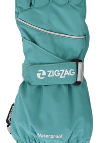Vattentät tealhandske med vadderad design, justerbart handledsband och reflekterande detaljer. Har logotypen "ZIGZAG" tydligt visad.