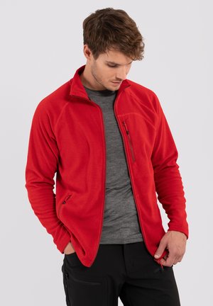 Red fleece jacket with a zippered chest pocket, zippered side pockets, and a high collar, paired with a gray t-shirt underneath.