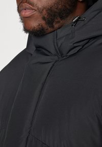 Jack & Jones JJWORLD PUFFER JACKET  - Winter jacket - black