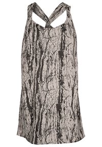 Top sin mangas con diseño halter en una tela ligera, que presenta un patrón de corteza de árbol en negro y beige con tirantes cruzados en la parte posterior.