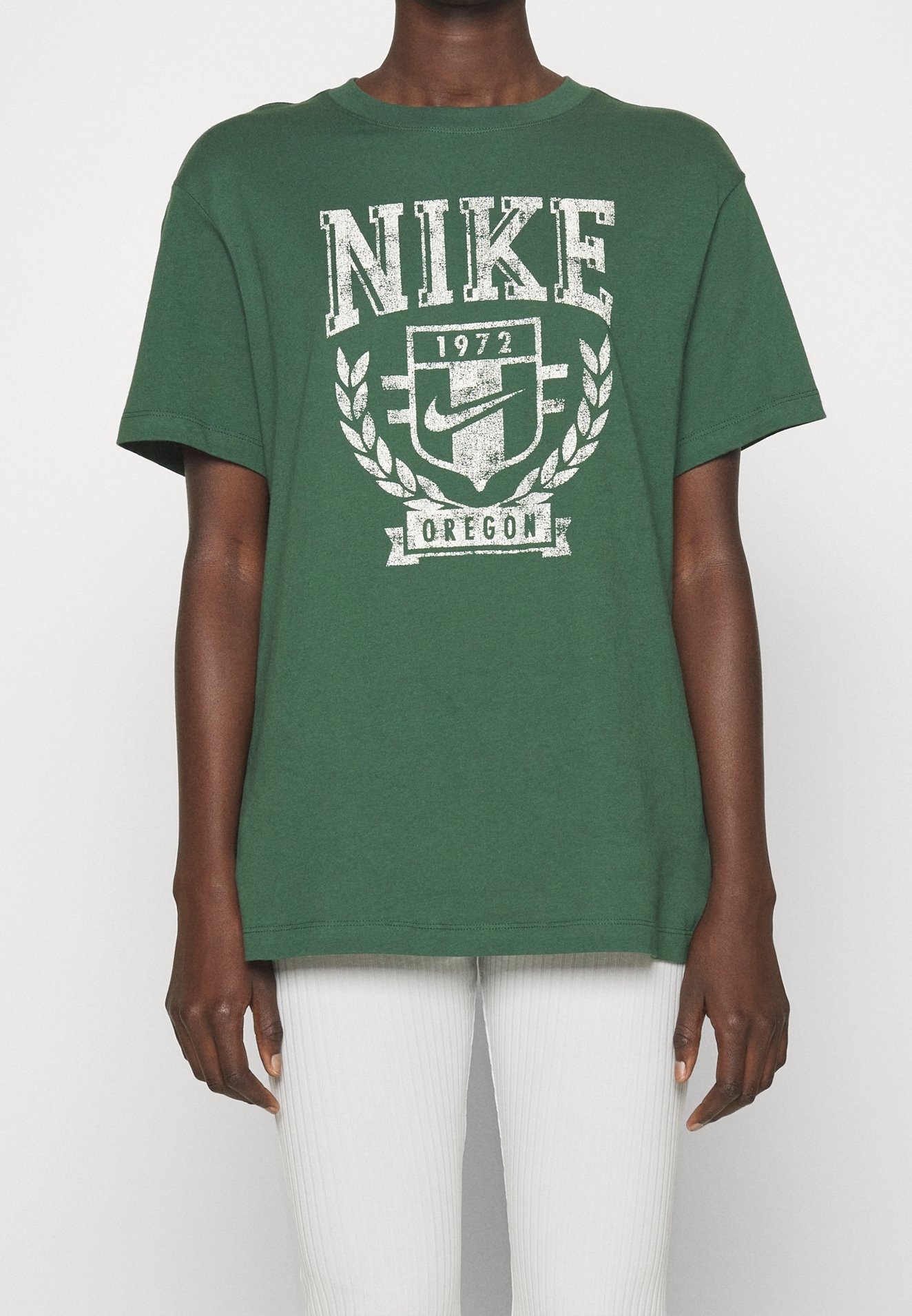 green and black nike t shirt